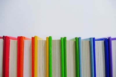 Close-up of colorful pencils on white background