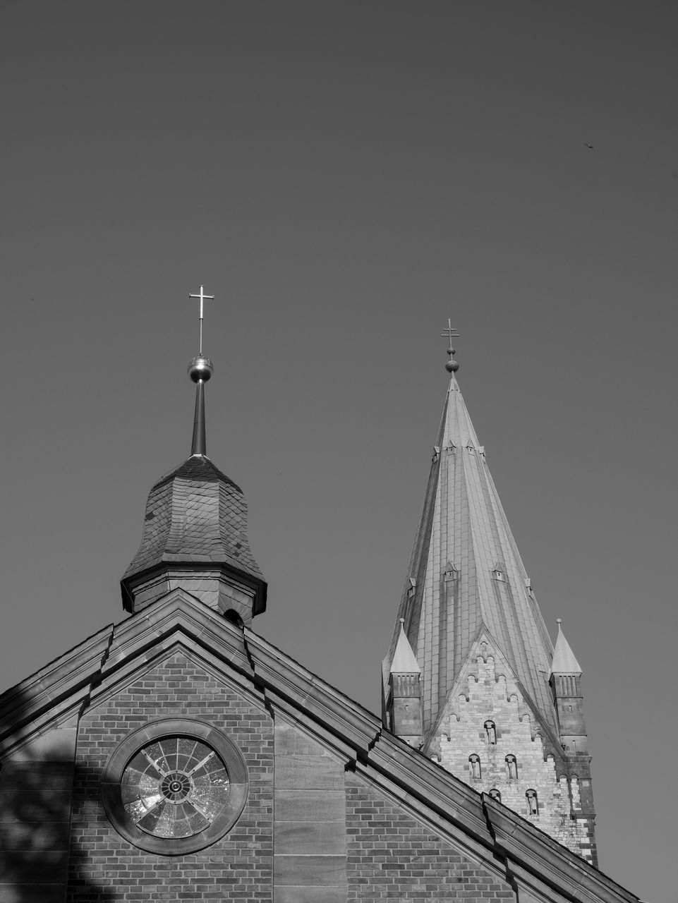 architecture, built structure, black and white, building exterior, place of worship, monochrome photography, monochrome, religion, belief, sky, tower, building, steeple, no people, spirituality, travel destinations, low angle view, white, nature, spire, clock, clear sky, catholicism, history, the past, worship, travel, time, city, outdoors, landmark, day