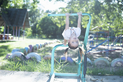 Portrait of boy playing in park