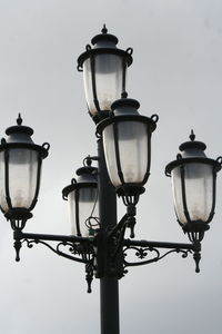 Low angle view of lanterns against sky