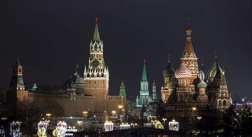 Illuminated buildings in city at night. kremlin. moscow.