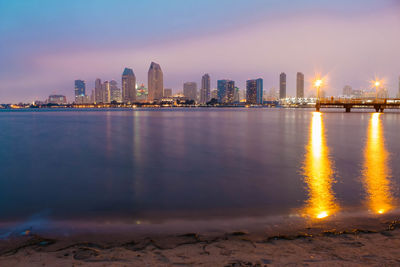 View of city lit up at night