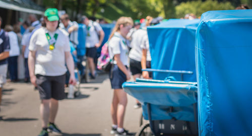 Group of people on garbage bin