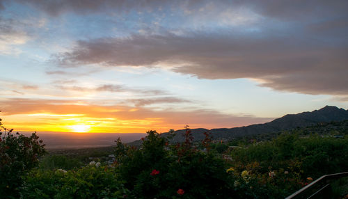 Scenic view of mountains against sky during sunset