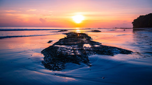 Scenic view of sea during sunset