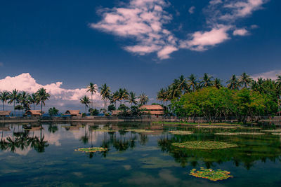 Scenic view of ponds against sky