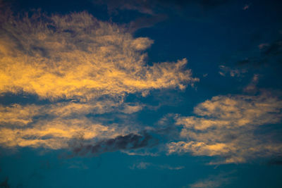 Low angle view of clouds in sky during sunset