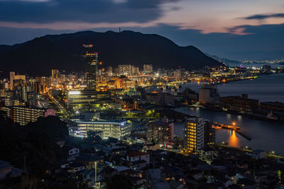 High angle view of illuminated city buildings