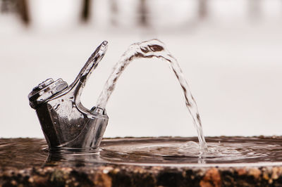 Close-up of beer glass on table