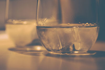 Close-up of water in glass on table