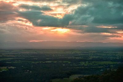 Scenic view of landscape against sky during sunset