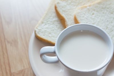 Close-up of coffee cup on table