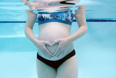 Woman swimming in pool