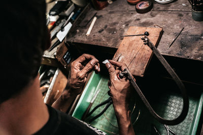 Man working on wood