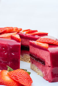Close-up of strawberries on white background