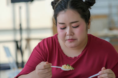 Close-up of woman painting