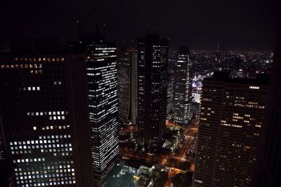 Illuminated cityscape at night