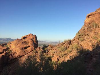 Scenic view of rocky mountains against clear sky