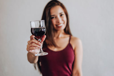 Portrait of a woman drinking glass