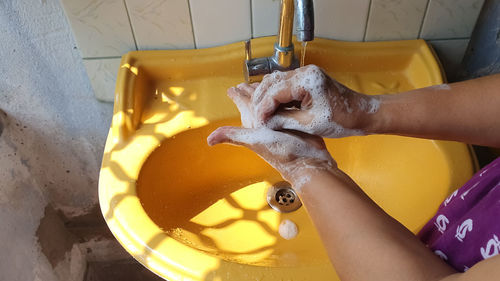 High angle view of man working in tray