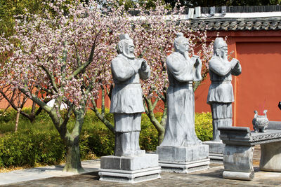 View of buddha statue in park