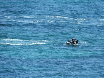 High angle view of man on jet boat in sea