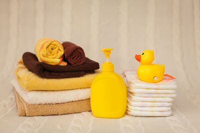 Close-up of yellow toys on table