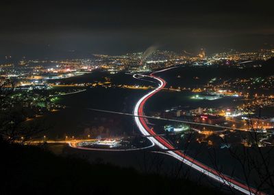 High angle view of illuminated city at night