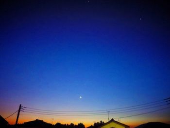 Low angle view of blue sky at night