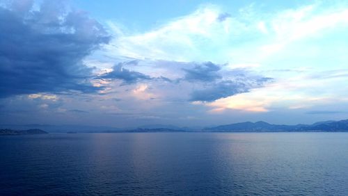 Scenic view of sea against cloudy sky