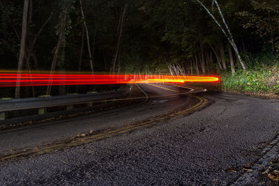 Light trails on road at night