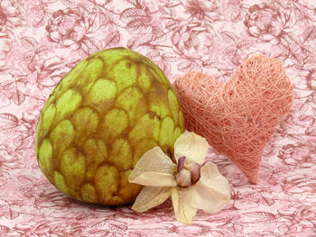 Close-up of fruit against white background