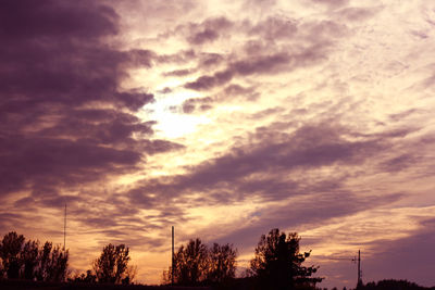 Low angle view of dramatic sky during sunset