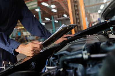 Man working in car