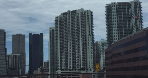 Low angle view of modern buildings against sky