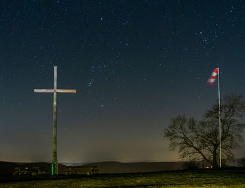 Scenic view of field against sky at night