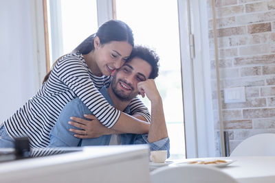 Young couple using smart phone