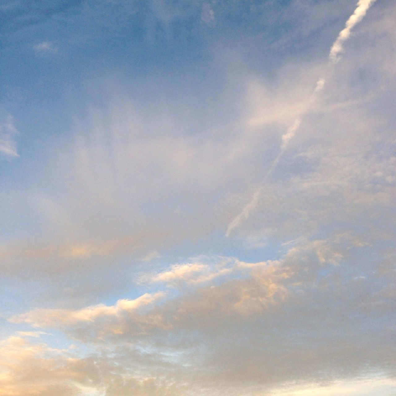 sky, cloud - sky, low angle view, tranquility, scenics, cloudy, beauty in nature, sky only, tranquil scene, cloudscape, nature, cloud, backgrounds, idyllic, full frame, blue, outdoors, weather, no people, day