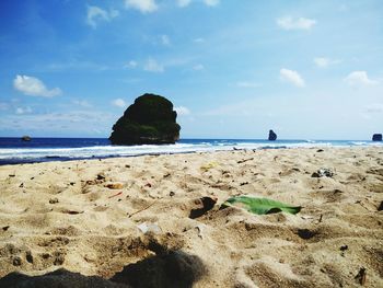 Scenic view of beach against sky