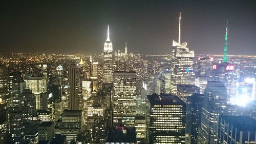 Illuminated cityscape at night