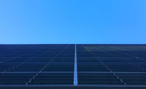 Low angle view of berlaymont against clear blue sky