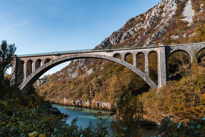 Solkan railway bridge across soca river in slovenia.