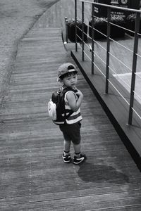 Full length of boy standing in park
