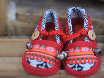 Close-up of shoes on table