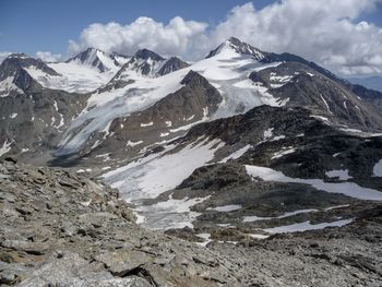 Scenic view of snowcapped mountains against sky