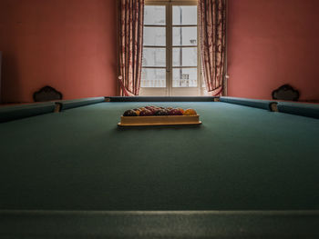 Pool balls on table at home