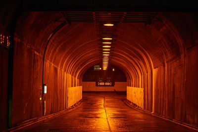 Empty corridor in tunnel