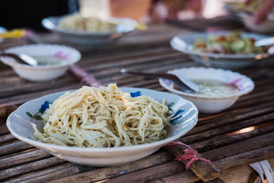 Close-up of noodles in bowl on table