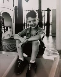 Kiddo cooling off om playground on a hot summer day.