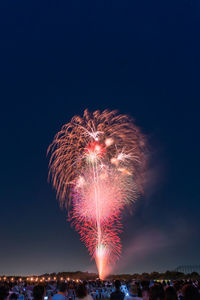 Firework display at night